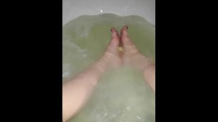 Girl Rolling with Feet a Bathbomb