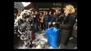 Woman Tarred and Feathered on Gameshow in Public