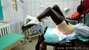 Nurse in Black Latex Leggings.