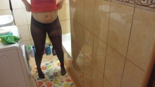 Pissing Standing Teen Girl taking off Nylon Tights