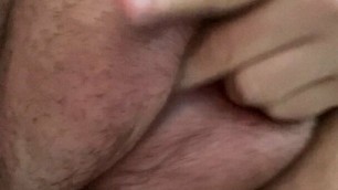Playing with my hairy, saline filled pussy lips