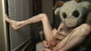 Skinny hairy white dude in a goat mask jerks off in a chair