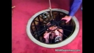 BDSM action wiht slut pussy is clamped