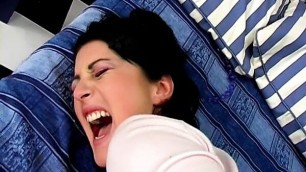 Naughty brunette plays with her pussy then stud comes to fuck her ass in bed
